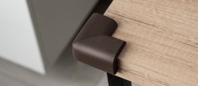 Protecting sharp furniture edges from children