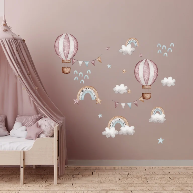 SIPO wall stickers in a child's room – pastel hot air balloons in pink and beige stripes, rainbows with clouds, garlands of flags and tiny stars on a warm pink wall in a child's room.