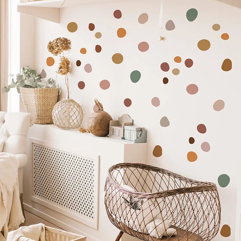 SIPO self-adhesive wall stickers – boho dots (earth-coloured dots) on a white wall in a children's room.